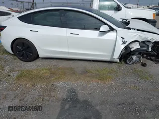2024 Tesla Model 3 Long Range with VIN 5YJ3E1EB7RF854092, listed as a IAAI auction lot 41697646 with 7,371 mi miles and . Bid and sale history available at DreamBid. Image 13.