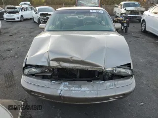 1996 Buick Regal Custom with VIN 2G4WB52K5T1517380, listed as a Copart auction lot 83106314 with 112,411 mi miles and Salvage title. Bid and sale history available at DreamBid. Image 5.