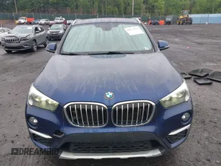 2018 BMW X1 xDrive28i with VIN WBXHT3C32J5L33213, listed as a IAAI auction lot 42513235 with 75,918 mi miles and . Bid and sale history available at DreamBid. Image 12.