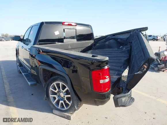 2015 GMC Sierra 1500 Denali with VIN 3GTU2WEC7FG204610, listed as a IAAI auction lot 41730939 with 130,620 mi miles. Bid and sale history available at carsss.com. Image 3.