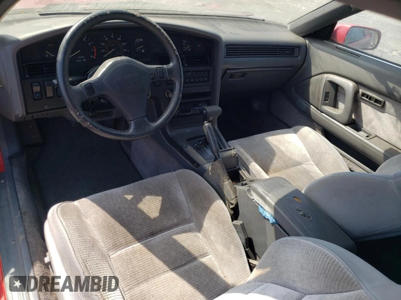1989 Toyota Supra z VIN JT2MA70J3K0114537, wystawiony jako Copart lot #72587854 z przebiegiem 189 813 mil mil oraz Czysty tytuł • Clean title. Historia ofert i sprzedaży dostępna na DreamBid. Obrazek 8.