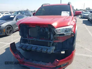 2018 Toyota Tacoma SR5 with VIN 3TMAZ5CN2JM067292, listed as a IAAI auction lot 41851959 with 70,988 mi miles and . Bid and sale history available at DreamBid. Image 6.