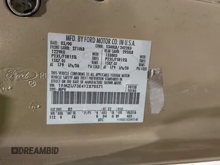 2000 Ford Explorer XLT z VIN 1FMZU73E4YZB70571, wystawiony jako IAAI lot #42317419 z przebiegiem 233 858 mil mil oraz . Historia ofert i sprzedaży dostępna na DreamBid. Obrazek 9.