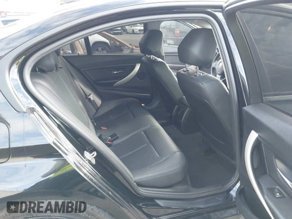 2016 BMW 3 Series 320i with VIN WBA8E1G52GNU11325, listed as a IAAI auction lot 42058241 with 104,596 mi miles and . Bid and sale history available at carsss.com. Image 8.