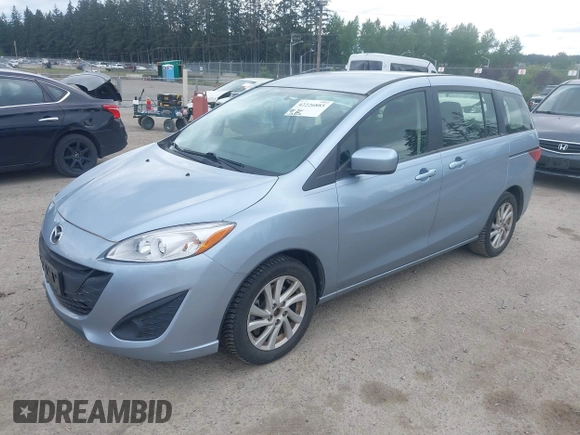 2012 Mazda 5 Sport with VIN JM1CW2BLXC0127258, listed as a IAAI auction lot 42226885 with 112,102 mi miles and . Bid and sale history available at DreamBid. Image 2.