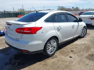 2015 Ford Focus Titanium с VIN 1FADP3J27FL341102, выставлен на аукционе IAAI как лот 41793450 с пробегом 96 465 миль миль и . История ставок и продаж доступна на DreamBid. Изображение 4.