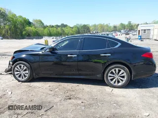 2012 Infiniti M with VIN JN1BY1AR1CM392880, listed as a IAAI auction lot 42012317 with 106,000 mi miles and . Bid and sale history available at DreamBid. Image 13.