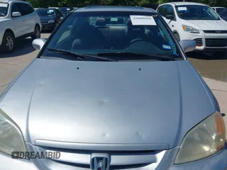 2003 Honda Civic EX with VIN 1HGEM22933L069450, listed as a IAAI auction lot 42088660 with 144,717 mi miles and . Bid and sale history available at DreamBid. Image 6.