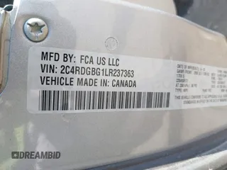 2020 Dodge Grand Caravan SE with VIN 2C4RDGBG1LR237363, listed as a IAAI auction lot 40096749 with 120,742 mi miles and . Bid and sale history available at DreamBid. Image 9.