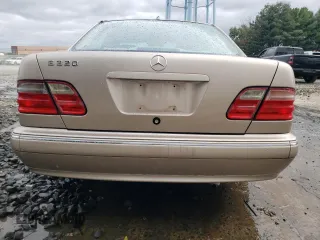 2001 Mercedes-Benz E-Class with VIN WDBJF65J01B389296, listed as a Copart auction lot 71933404 with 124,392 mi miles and Salvage Title. Bid and sale history available at carsss.com. Image 6.
