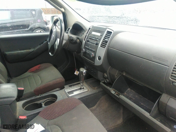 2011 Nissan Frontier PRO-4X with VIN 1N6AD0EV2BC438370, listed as a IAAI auction lot 41952484 with 217,529 mi miles. Bid and sale history available at carsss.com. Image 5.
