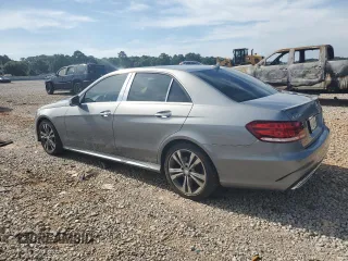 2014 Mercedes-Benz E 350 Sport with VIN WDDHF5KB5EB047443, listed as a Copart auction lot 61970945 with 119,998 mi miles and Salvage title. Bid and sale history available at DreamBid. Image 2.