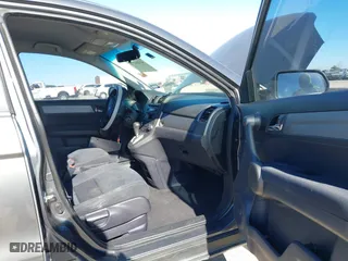 2011 Honda CR-V LX with VIN 3CZRE3H32BG704945, listed as a IAAI auction lot 41414275 with 218,831 mi miles. Bid and sale history available at carsss.com. Image 5.
