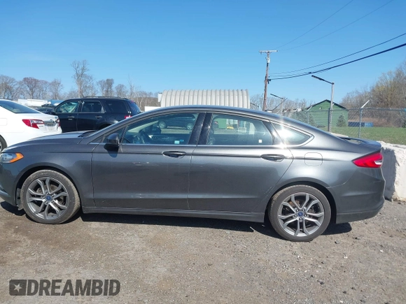 2017 Ford Fusion SE z VIN 3FA6P0HD8HR211638, wystawiony jako IAAI lot #42029399 z przebiegiem 90 262 mil mil oraz . Historia ofert i sprzedaży dostępna na DreamBid. Obrazek 14.