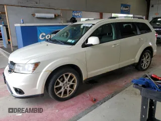 2013 Dodge Journey SXT with VIN 3C4PDDBG1DT521452, listed as a Copart auction lot 62660785 with 177,945 mi miles and Salvage title. Bid and sale history available at DreamBid. Image 1.