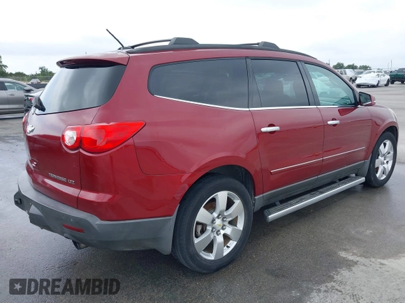 2011 Chevrolet Traverse LTZ z VIN 1GNKRLED6BJ142238, wystawiony jako IAAI lot #42183153 z przebiegiem 149 483 mil mil oraz . Historia ofert i sprzedaży dostępna na DreamBid. Obrazek 4.