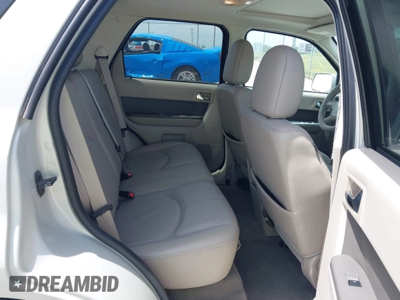 2009 Mercury Mariner Premier с VIN 4M2CU87799KJ21771, выставлен на аукционе IAAI как лот 42256896 с пробегом 107 667 миль миль и . История ставок и продаж доступна на DreamBid. Изображение 8.