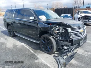 2015 Chevrolet Suburban LTZ with VIN 1GNSCKKC0FR228045, listed as a IAAI auction lot 41141374 with 155,914 mi miles and . Bid and sale history available at DreamBid. Image 1.