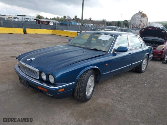 1996 Jaguar XJ Series Sedan with VIN SAJHX1743TC759842, listed as a IAAI auction lot 41778155 with NaN miles. Bid and sale history available at carsss.com. Image 2.