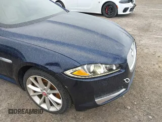 2015 Jaguar XF V6 Portfolio with VIN SAJWJ0FF5F8U67140, listed as a IAAI auction lot 41967522 with 68,000 mi miles. Bid and sale history available at carsss.com. Image 6.