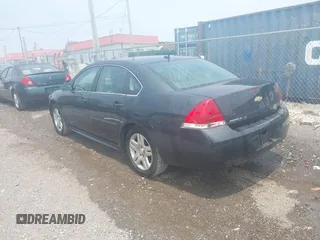 2015 Chevrolet Impala LT with VIN 2G1WB5E33F1127786, listed as a IAAI auction lot 42467374 with 160,964 mi miles and . Bid and sale history available at DreamBid. Image 3.