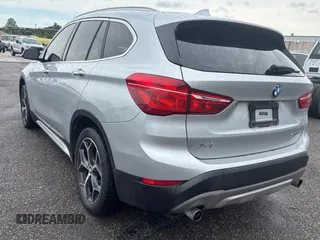2018 BMW X1 sDrive28i with VIN WBXHU7C38J5L08773, listed as a Copart auction lot 55470955 with 149,885 mi miles and Clean Title. Bid and sale history available at DreamBid. Image 3.