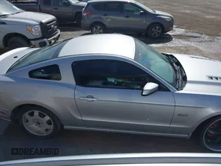 2013 Ford Mustang GT with VIN 1ZVBP8CF7D5216131, listed as a IAAI auction lot 41648862 with 107,983 mi miles. Bid and sale history available at carsss.com. Image 13.