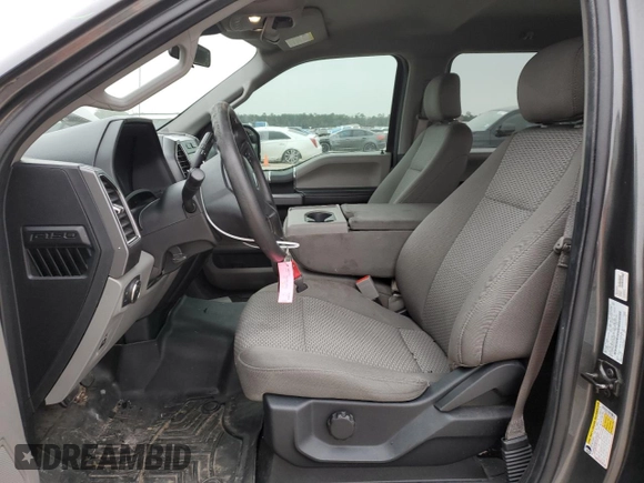 2020 Ford F-150 XL with VIN 1FTEW1CB1LKD56067, listed as a Copart auction lot 87887395 with 106,980 mi miles and Salvage Title. Bid and sale history available at carsss.com. Image 7.