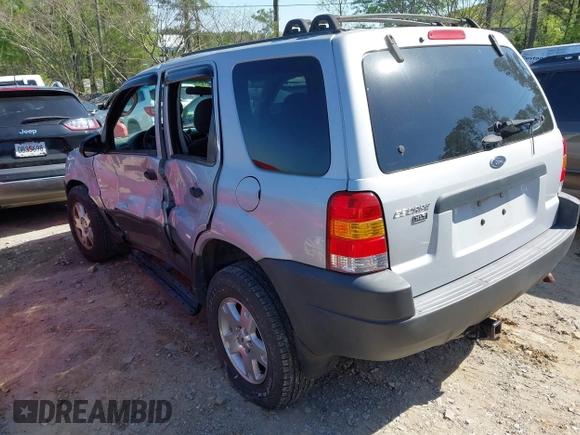 2003 Ford Escape XLT Popular 2 with VIN 1FMYU93183KD62338, listed as a IAAI auction lot 41990799 with 216,952 mi miles and . Bid and sale history available at DreamBid. Image 3.