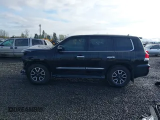 2013 Lexus LX 570 with VIN JTJHY7AXXD4128032, listed as a IAAI auction lot 41794039 with 125,431 mi miles and . Bid and sale history available at carsss.com. Image 15.