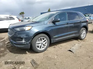 2024 Ford Edge SEL z VIN 2FMPK4J92RBA58793, wystawiony jako Copart lot #52955955 z przebiegiem 8 451 mil mil oraz Nie do naprawy • Non repairable. Historia ofert i sprzedaży dostępna na DreamBid. Obrazek 1.
