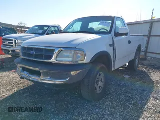 1997 Ford F-150 with VIN 1FTDF1825VNC38853, listed as a IAAI auction lot 41436001 with Not provided miles and . Bid and sale history available at DreamBid. Image 2.