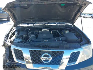 2014 Nissan Frontier SV with VIN 1N6AD0ER0EN748545, listed as a IAAI auction lot 41590392 with 112,598 mi miles. Bid and sale history available at carsss.com. Image 10.