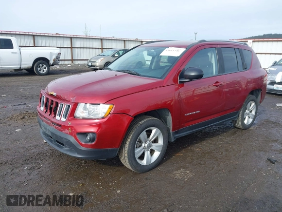 2013 Jeep Compass Sport with VIN 1C4NJDBB2DD207609, listed as a IAAI auction lot 41653746 with 121,697 mi miles. Bid and sale history available at carsss.com. Image 2.