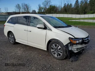 2016 Honda Odyssey Touring Elite with VIN 5FNRL5H90GB007492, listed as a Copart auction lot 55474445 with Not Provided miles and Salvage Title. Bid and sale history available at DreamBid. Image 4.