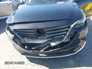2017 Mazda CX-9 Grand Touring with VIN JM3TCBDY0H0130671, listed as a IAAI auction lot 42514237 with 81,016 mi miles and . Bid and sale history available at DreamBid. Image 6.