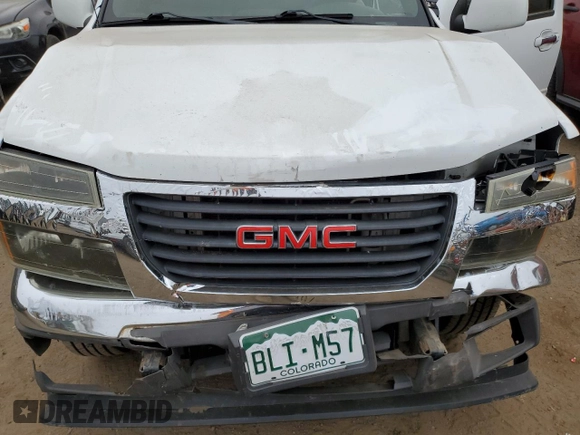 2011 GMC Canyon z VIN 1GTD5NF95B8101500, wystawiony jako Copart lot #84246754 z przebiegiem 130 506 mil mil oraz Szkoda całkowita • Salvage title. Historia ofert i sprzedaży dostępna na DreamBid. Obrazek 11.