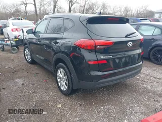 2021 Hyundai Tucson Value with VIN KM8J33A47MU359385, listed as a IAAI auction lot 41878386 with 84,991 mi miles and . Bid and sale history available at DreamBid. Image 3.