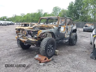 2012 Jeep Wrangler Unlimited Sahara with VIN 1C4BJWEG0CL167797, listed as a IAAI auction lot 42331710 with Not provided miles and . Bid and sale history available at DreamBid. Image 2.