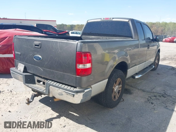 2005 Ford F-150 XLT with VIN 1FTPX12575NA22872, listed as a IAAI auction lot 41532157 with 261,093 mi miles. Bid and sale history available at carsss.com. Image 4.