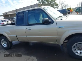 2002 Mazda B-Series 2WD Truck DS with VIN 4F4YR16U52TM18118, listed as a IAAI auction lot 41563022 with 126,136 mi miles. Bid and sale history available at carsss.com. Image 13.