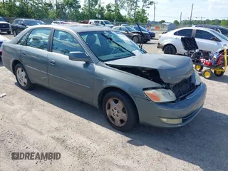 2004 Toyota Avalon XL z VIN 4T1BF28B34U387033, wystawiony jako IAAI lot #42265411 z przebiegiem 215 440 mil mil oraz . Historia ofert i sprzedaży dostępna na DreamBid. Obrazek 1.