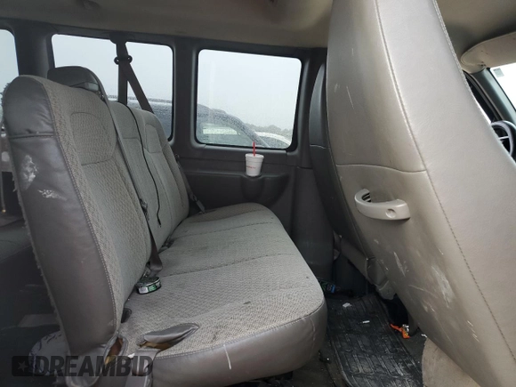 2010 Chevrolet Express Passenger LT z VIN 1GA2G1DG7A1107293, wystawiony jako Copart lot #78936284 z przebiegiem 178 012 mil mil oraz Szkoda całkowita • Salvage title. Historia ofert i sprzedaży dostępna na DreamBid. Obrazek 11.