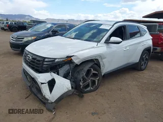 2022 Hyundai Tucson SEL z VIN 5NMJF3AE2NH062926, wystawiony jako IAAI lot #41969902 z przebiegiem 41 882 mil mil oraz . Historia ofert i sprzedaży dostępna na DreamBid. Obrazek 6.