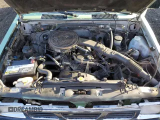 1989 Nissan Hardbody z VIN 1N6ND16S1KC396897, wystawiony jako Copart lot #85928624 z przebiegiem 148 866 mil mil oraz Szkody całkowita. Historia ofert i sprzedaży dostępna na DreamBid. Obrazek 11.