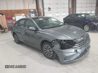 2019 Volkswagen Jetta S z VIN 3VWCB7BUXKM133894, wystawiony jako IAAI lot #42241285 z przebiegiem 91 358 mil mil oraz . Historia ofert i sprzedaży dostępna na DreamBid. Obrazek 1.