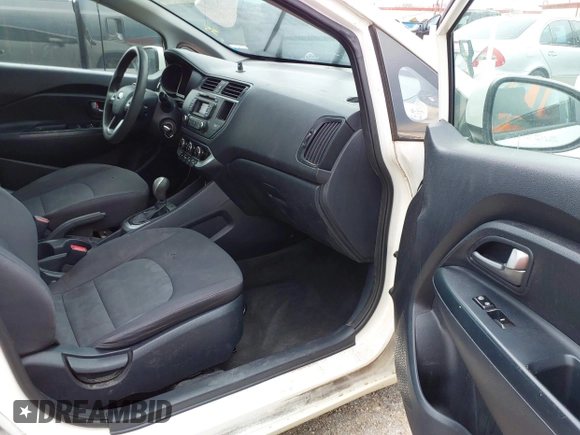 2014 Kia Rio LX with VIN KNADM4A3XE6384733, listed as a IAAI auction lot 42196921 with 153,084 mi miles and . Bid and sale history available at DreamBid. Image 5.