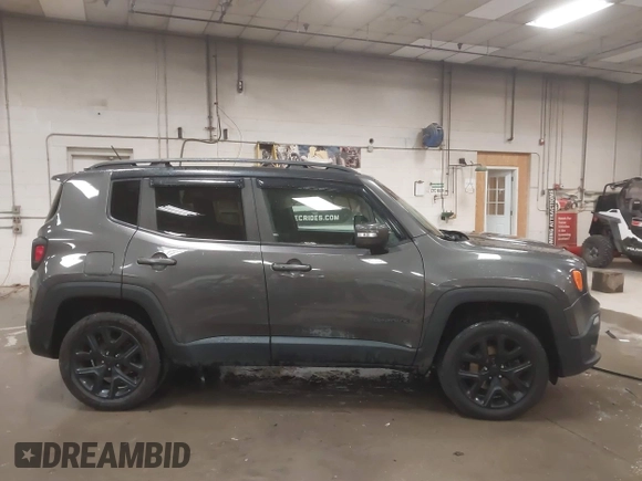 2016 Jeep Renegade Latitude with VIN ZACCJBBT5GPD69471, listed as a IAAI auction lot 40650863 with 137,944 mi miles. Bid and sale history available at carsss.com. Image 13.