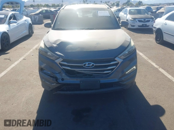 2018 Hyundai Tucson SEL z VIN KM8J33A42JU681606, wystawiony jako IAAI lot #41067514 z przebiegiem 150 119 mil mil oraz . Historia ofert i sprzedaży dostępna na DreamBid. Obrazek 6.