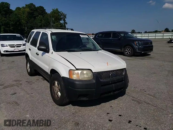 2004 Ford Escape XLS with VIN 1FMYU021X4DA07352, listed as a Copart auction lot 68909864 with 275,776 mi miles and Salvage Title. Bid and sale history available at DreamBid. Image 12.